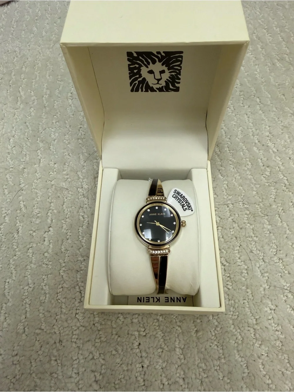 Anne Klein Black Dial Rose Gold-Tone Crystal Accent Bangle Watch